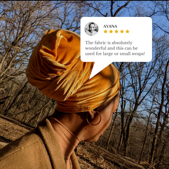 Woman wearing earrings and a head wrap with a positive review